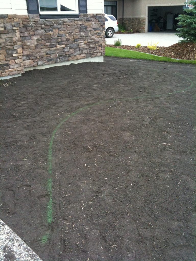 perfectly raked/marked topsoil