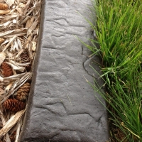 Dark charcoal base, black release, stone stamp