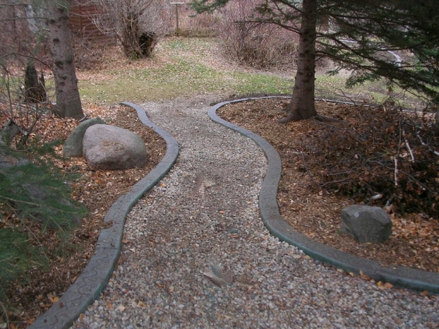 gravel path bordered by curbing
