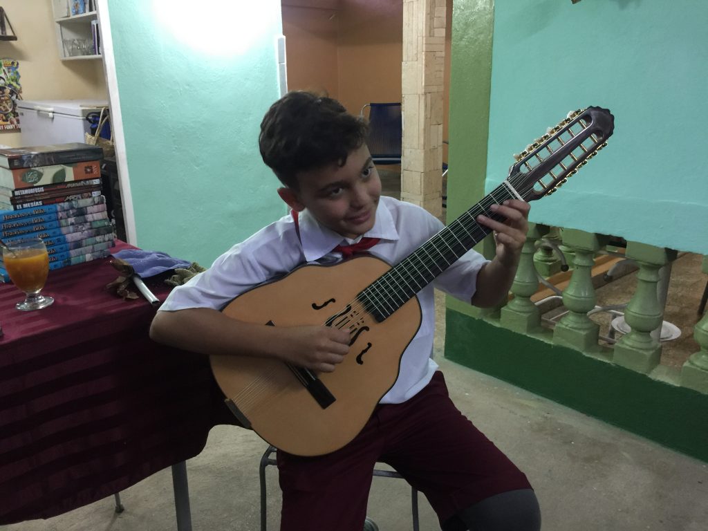 cuban boy playing the Laud