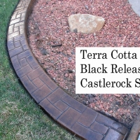 Base-  terra cotta dark Release-  black  Stamp- castlerock curb