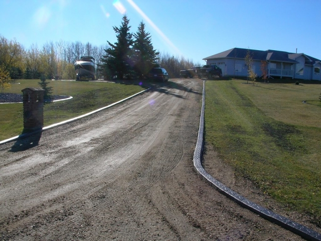 Flat top curb as driveway edging