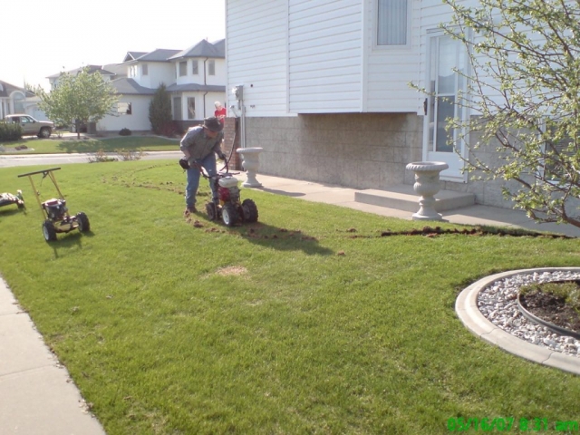 Our own custom built sod cutter- light and maneuverable